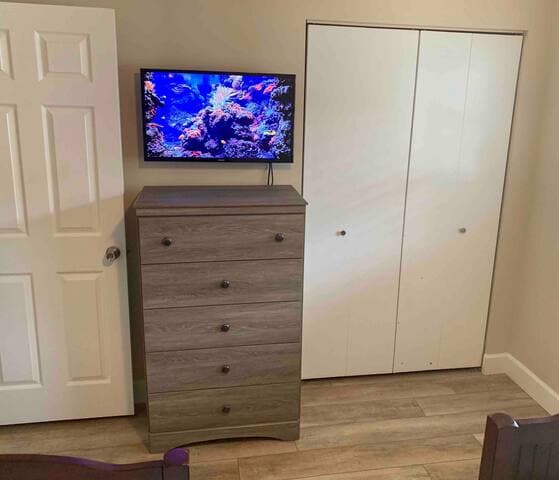 32” Smart tv and plenty of storage in the guest room.