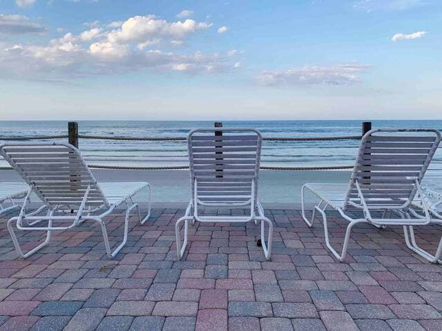 Our poolside condo is just steps to this front row view of the sand & surf! Grab your drink!
