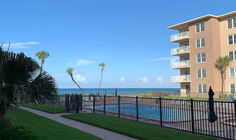 Walk out to our pool and steps to beach access! Easy access makes this a family favorite choice!