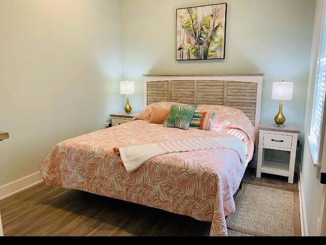 Master bedroom with USB chargers on the rear of the nightstands.  