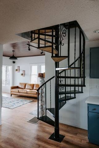 Guests will use the spiral staircase to access the additional two bedrooms.