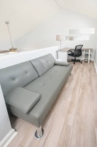 Your DREAM space to work from home. A charming loft area with plenty of natural light, tall ceilings and a convertible couch sleeper.