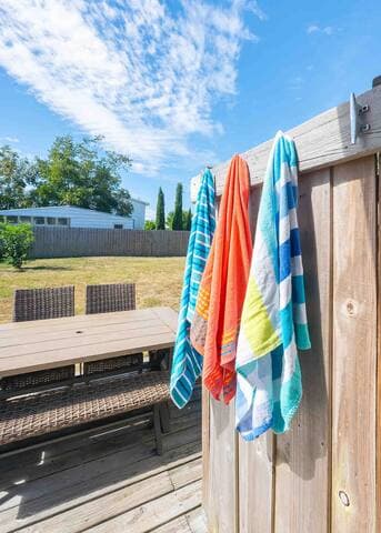 After a perfect day at the beach, an outdoor shower awaits to refresh and keep the sand at bay.