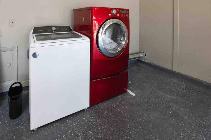 Washer and dryer are available in the garage with a table for folding.