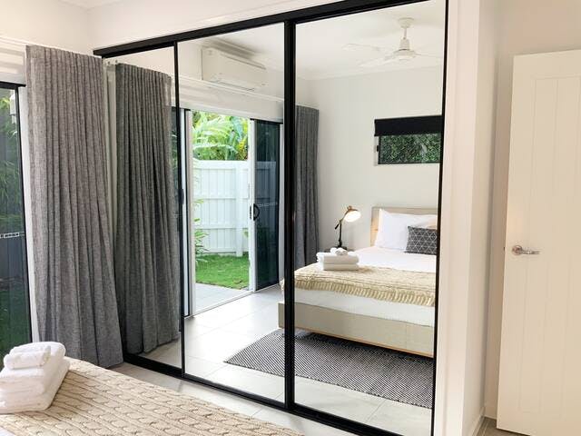 The master bedroom has large full height mirrored robes, perfect for preparing for a night out.