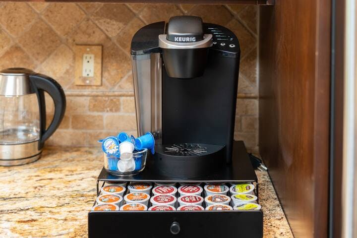 Dedicated tea and coffee station complete with a Keurig machine for your convenience