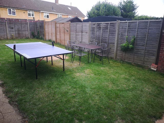 Garden with Chairs and Table Tennis