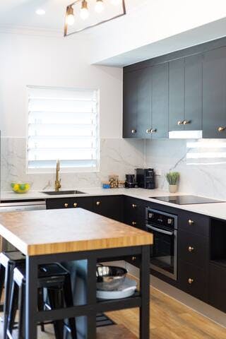 Light filled kitchen is perfect for that morning or even meal on the island bench.