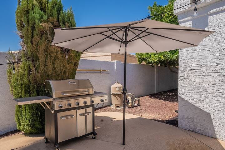 FEATURE #4: Grill! Bring out your inner chef in the backyard oasis with this stylish propane grill, all set to cook up mouthwatering dishes for delightful outdoor feasts and memorable barbecues.