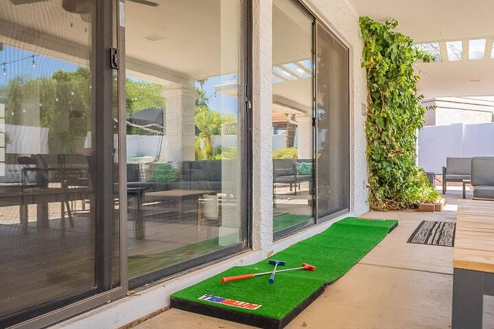 FEATURE #3: Games! Enjoy friendly competition and enhance your putting skills in the golfing haven of Scottsdale, as our backyard oasis provides the perfect setting to practice and refine your game.