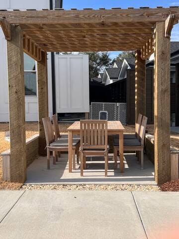 Community outdoor table and chairs located directly across from our unit