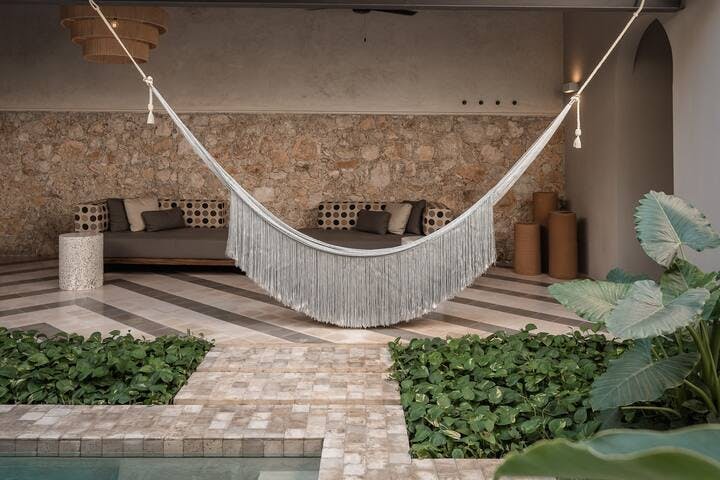 Terrace lounging area with 14foot sofa and hammock
