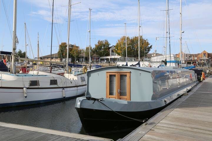 External view of the Liverpool Boat showing the front outside seating area. 