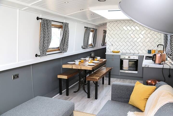 Living area and kitchen on the Liverpool Boat. The boat sleeps 6 and is moored in Liverpool Marina. 