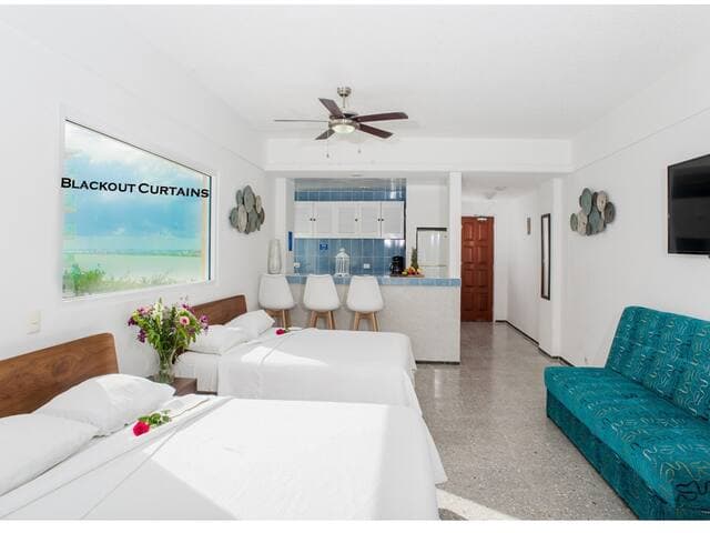 Kitchen includes everything you need to make meals - fridge, dishes, pots and pans, microwave.