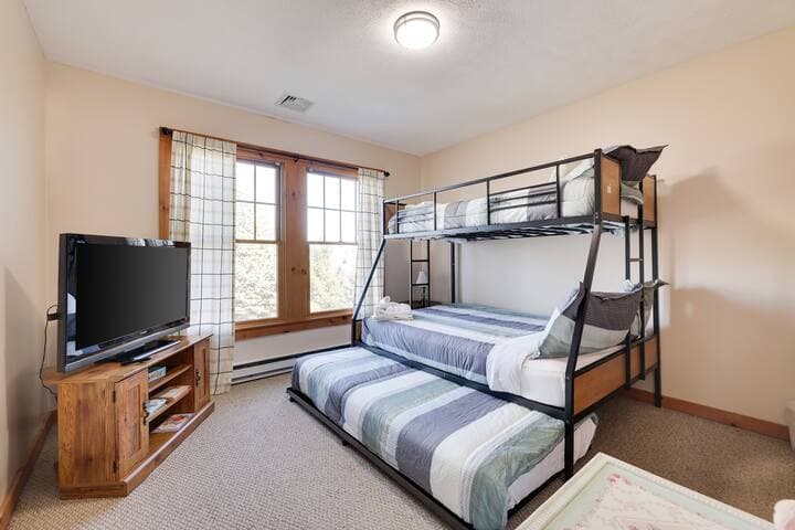 Bunk bed room located on the second floor. Two full beds with dull trundle pullout.