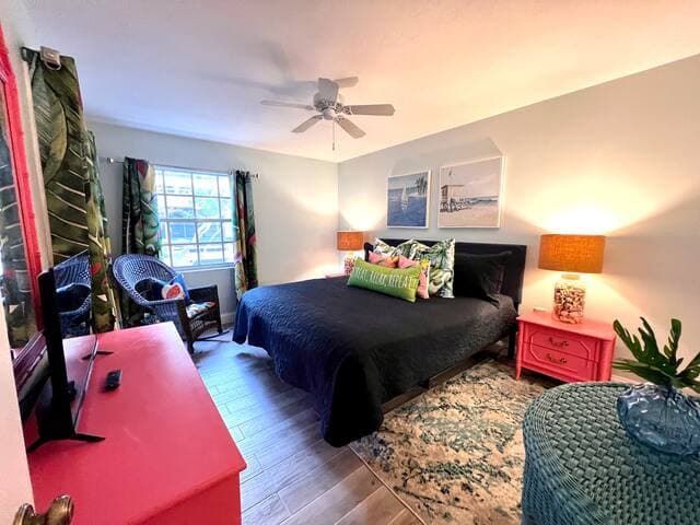 Primary bedroom has king-size bed and en-suite bathroom. Plenty of drawers and closet space.