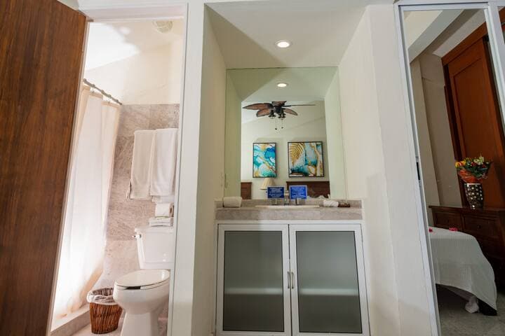 Upstairs bathroom, vanity and closet.