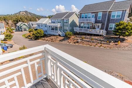 View from upper balcony to the street in front of house. Awesome neighborhood.