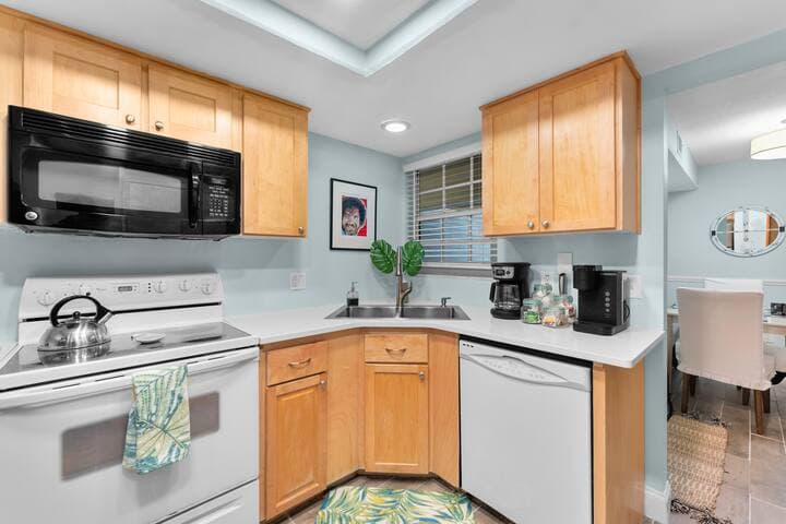 Kitchen view looking into dining area.