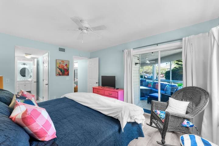 View of veranda (screened porch) and closeted hallway leading to en-suite bathroom.