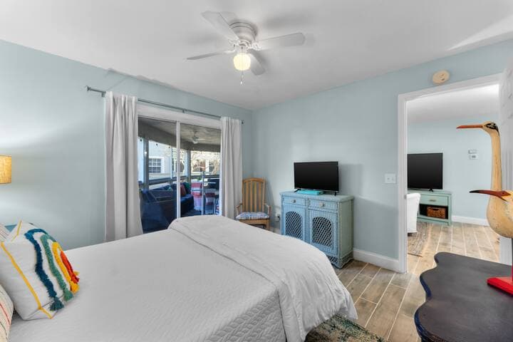 Second bedroom view of veranda and doorway leading to main living area.