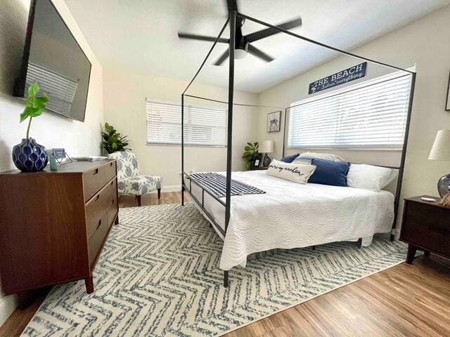 Primary bedroom features a king-size bed, smart TV and plenty of space to store your belongings.