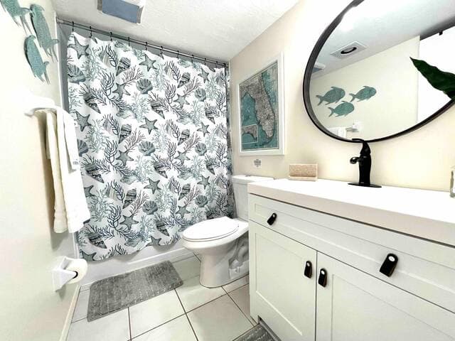 Bathroom has tub/shower combo.