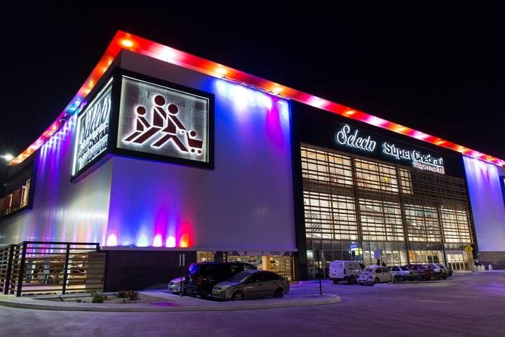 Selecto is a grocery store that is walking distance. Huge bakery, fresh produce, seafood market, liquor selection and food court inside.