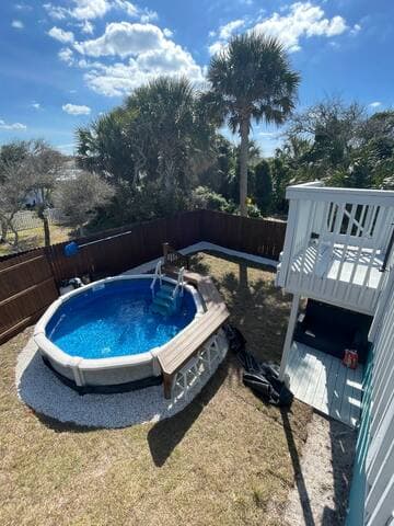 Your own backyard oasis includes a refreshing pool, spacious private yard and outdoor shower!